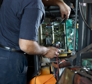 Man working on a circuit board