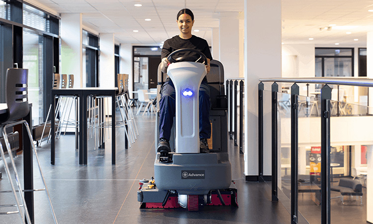 Man on nilfisk cleaning equipment