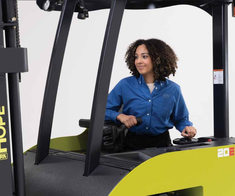 Female operating Clark Electric Lift Truck