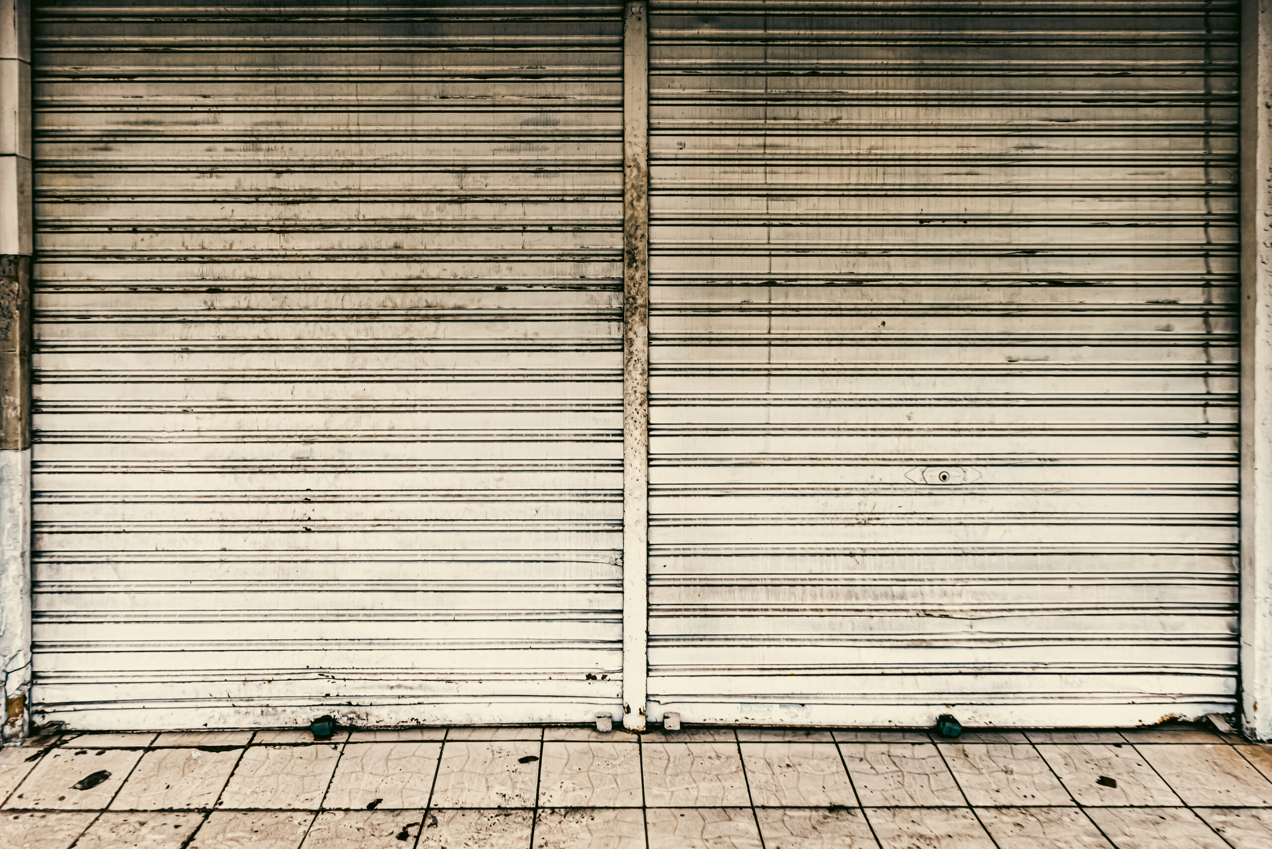 Commercial door repair vs replacement