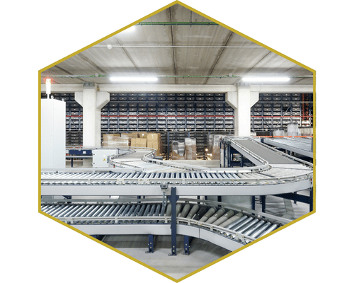 Modern warehouse with conveyor systems and industrial equipment